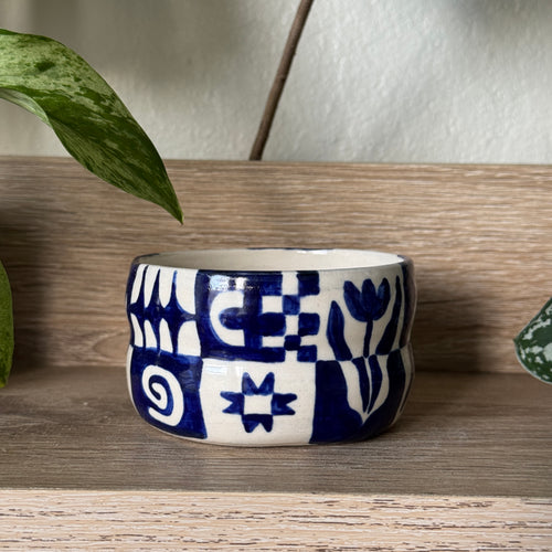 curious porcelain blue sauce bowl