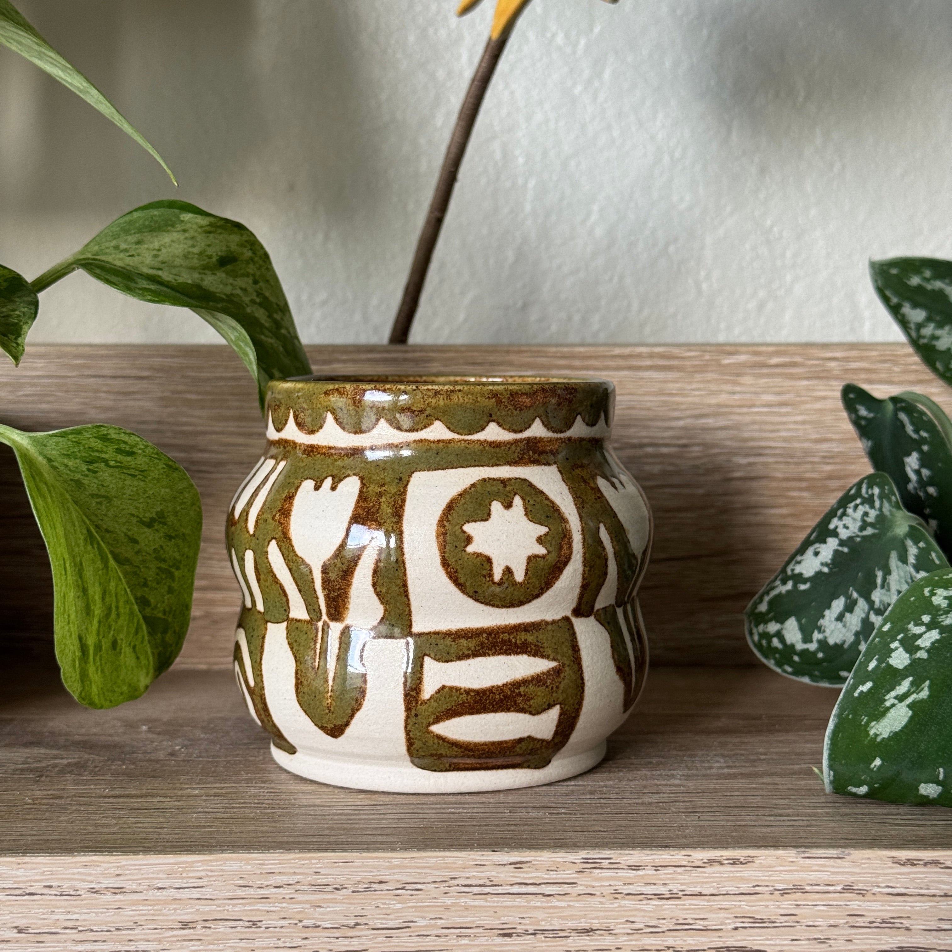 curious symbols vessel