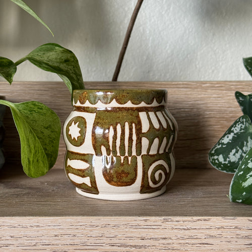 curious symbols vessel